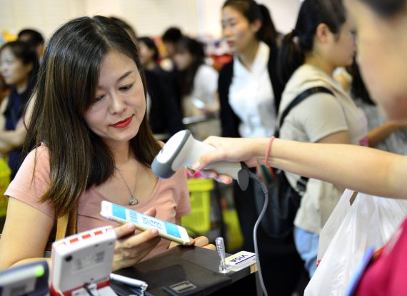 Bargeldloses Zahlen via WeChat Pay feiert am Flughafen München Deutschlandpremiere.