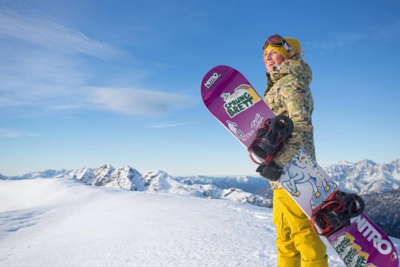 mb-160105-Nicola-Thost-by-SandraBirklbauer Snowboarder Nicola Thost in the mountains with her snowboard