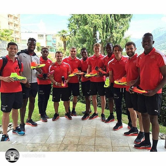The Swiss soccer team poses with Nike shoes