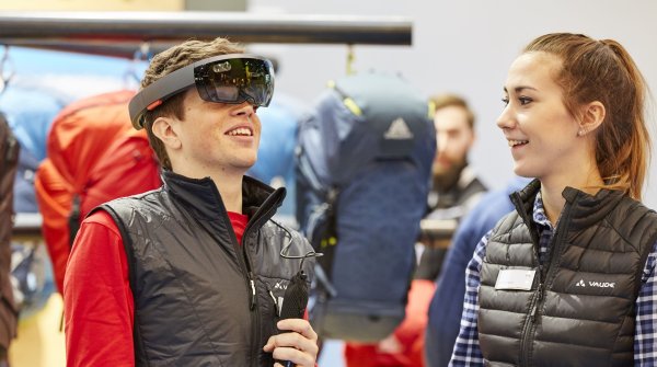 A participant is checking out VR at ISPO