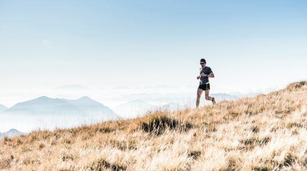Person in the mountains while trail running