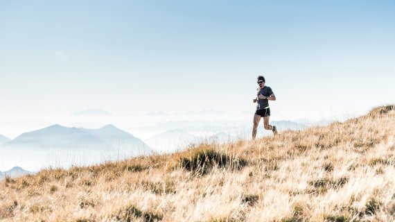 Person in the mountains while trail running